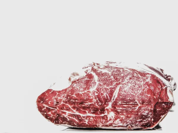 What Are The Benefits Of The Carnivore Diet? 6 Raw Beef Meat on White Background