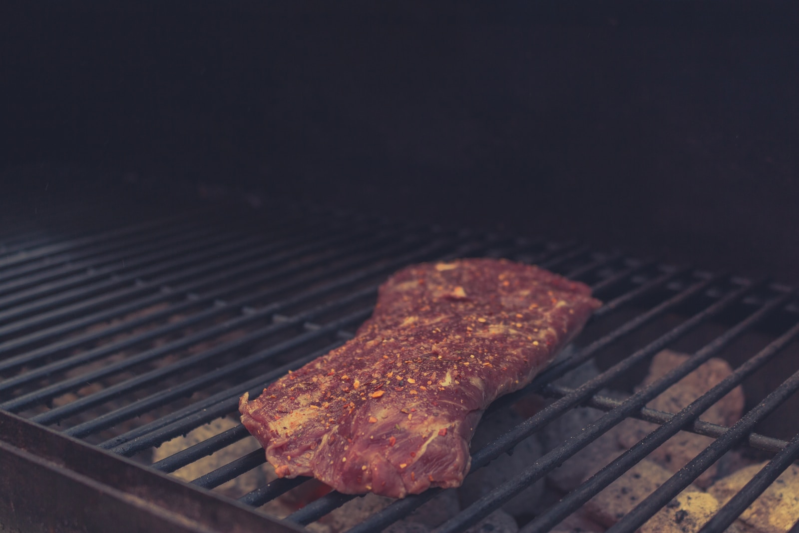 Photo by fstop314.com grilled meat on charcoal grill
