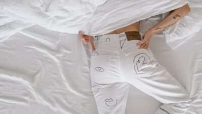 How To Get Rid Of The Habit Of Sleeping Late? 9 woman in white dress lying on bed