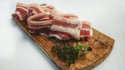 What Should I Expect On A Carnivore Diet? 8 Food Photography of Sliced Bacon on Top of Brown Chopping Board