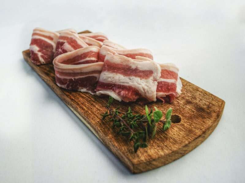 What Should I Expect On A Carnivore Diet? 2 Food Photography of Sliced Bacon on Top of Brown Chopping Board